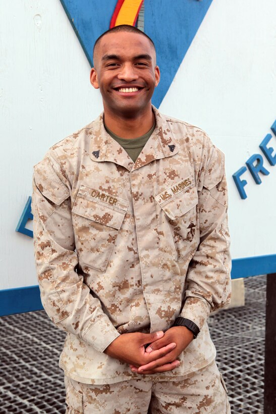 Corporal James Carter, an administrative specialist with Regimental Combat Team 7, volunteers his time at Camp Pendleton, Calif., to share his experiences with the Eagle Young Marines, a group that teaches boys ages 8-18 about discipline and leadership through military values. "It's great to see the discipline and knowledge begin to change (Eagle Young Marines') lives," Carter said. "I like knowing that I made a difference."