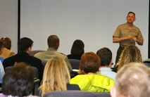 Brig. Gen. Frank Kelley, commander of Marine Corps Systems Command, speaks to participants in MCSC’s 2013 mentoring session during orientation training March 28 in Dumfries, Va. 