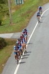 Members of the Maine Air National Guard Cycle Team ride along U.S. Route 1 outside Freeport, Maine, during the final leg of a 170-mile, three-day bicycle trek from Bangor to Portland. The Air Guard members rode to promote Air Force Week New England, Aug. 17-26, and they spoke with people about the Air Guard during their trek.