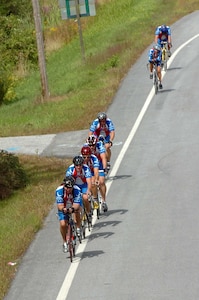 Members of the Maine Air National Guard Cycle Team ride along U.S. Route 1 outside Freeport, Maine, during the final leg of a 170-mile, three-day bicycle trek from Bangor to Portland. The Air Guard members rode to promote Air Force Week New England, Aug. 17-26, and they spoke with people about the Air Guard during their trek.