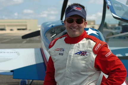 Aerobatic pilot Maj. John Klatt, from the Air National Guard's Guarding America, Defending Freedom Aerobatic Team, performed at the Cape Cod Air Show, Otis Air National Guard Base in Massachusetts Aug. 24 in his Staudacher S-300D, 350-horsepower stunt airplane. Klatt and his support team travel to air shows across the nation promoting the Air National Guard.