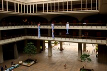 Hawaii Governor Neil Abercrombie, Honolulu Mayor Kirk Caldwell, U.S. Navy Capt. Jeff James and Dr. Gerald Fryer, senior geophysics at NOAA's Pacific Tsunami Warning Center, unfurls one of four banners to mark the Tsunami Awareness Month proclamation made April 1, 2013 at the state Capitol building. The Hawaii State Civil Defense, the mayor of the city and county of Honolulu, Department of Emergency Management and National Oceanographic and Atmospheric Administration's National Weather Service and representatives from the Department of Defense all took part in the proclamation which emphasizes the importance of tsunami awareness and preparedness for residents and visitors of Hawaii. (U.S. Navy photo/Tom Clements)