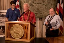 City of Honolulu Mayor Kirk Caldwell proclaims April in Hawaii as Tsunami Awareness Month at the state capitol building  April 1, 2013 alongside Hawaii Gov. Neil Abercrombie (right) and Dr. Gerald Fryer, senior geophysics at NOAA's Pacific Tsunami Warning Center. The Hawaii State Civil Defense, the mayor of the city and county of Honolulu, Department of Emergency Management and National Oceanographic and Atmospheric Administration's National Weather Service and representatives from the Department of Defense all took part in the proclamation which emphasizes the importance of tsunami awareness and preparedness for residents and visitors of Hawaii. (U.S. Air Force photo/Staff Sgt. Mike Meares)