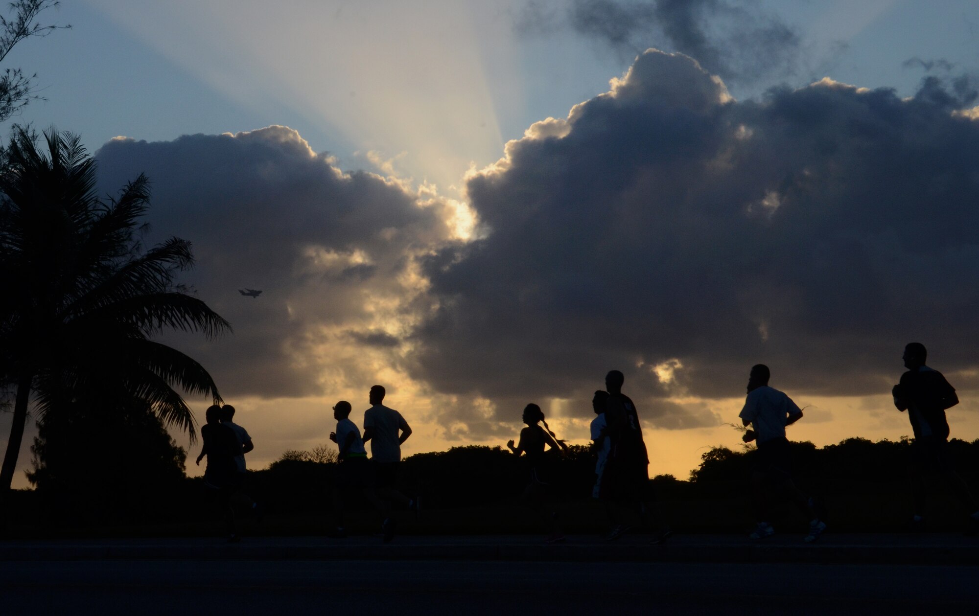 Members of Team Andersen run in the Sexual Assault Awareness Month 5K on Andersen Air Force Base, Guam, April 3, 2013. The month of April is National Sexual Assault Awareness Month, and the 36th Wing has several events planned to show support in the fight against sexual assault. (U.S. Air Force photo by Senior Airman Benjamin Wiseman/Released)