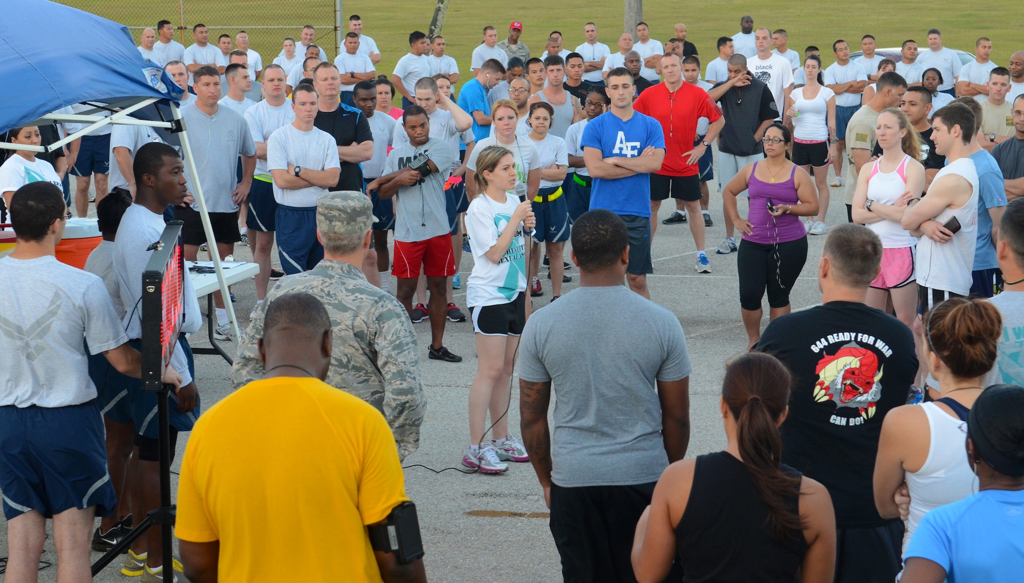 1st Lt. Jamie Guy, 36th Wing executive assistant to the vice commander, thanks members of Team Andersen for participating in the Sexual Assault Awareness Month 5K run on Andersen Air Force Base, Guam, April 3, 2013. Several units, including civilians and spouses, participated in the run to raise awareness in the fight against sexual assault. (U.S. Air Force photo by Senior Airman Benjamin Wiseman/Released)