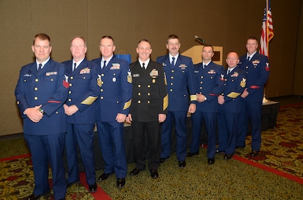 Master Chief Petty Officer of the Navy Michael Stevens and service members of the year from various Coast Guard commands in the Joint Base Charleston vicinity, during a Charleston Council of the Navy League sponsored recognition dinner held at the North Charleston-Airport Embassy Suites Hotel and Convention Center, March 28, 2013. Left to right: Coast Guard Petty Officer 1st Class Joseph Tronco, III, Chief Petty Officer Ed Owens, Senior Chief Petty Officer Cory Gunkel, MCPON Stevens, Coast Guard Capt. Michael White, Petty Officer 3rd Class Nathaniel Romeo, Chief Petty Officer Dennis Krakowski and Petty Officer 1st Class Jon Reary. The MCPON toured various commands during his Joint Base Charleston visit, including The Citadel, and discussed leadership and “Zeroing in on Excellence” at each location. (U.S. Navy photo/ Petty Officer 1st Class Chad Hallford)