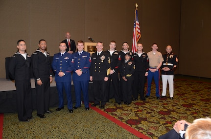 Master Chief Petty Officer of the Navy Michael Stevens recognizes service members of the year from various Navy, Marine Corps and Coast Guard commands throughout the Joint Base Charleston area, during a Charleston Council of the Navy League sponsored-recognition dinner held at the North Charleston-Airport Embassy Suites Hotel and Convention Center, March 28, 2013. Pictured from left: Navy Petty Officers 1st Class Ismael Zendejes, André Thercy, Coast Guard Petty Officers 3rd Class Nathaniel Romeo, 1st Class Joseph Tronco, III, MCPON Stevens, Navy Petty Officers 1st Class Chris Bracht, Joshua Gutierrez, Jinnett Santos and Jason Zerweck, Marine Corps Cpl. Oscar Messenger and Gunnery Sgt. Rodney Messenger. The MCPON toured various commands during his Joint Base Charleston visit, including The Citadel, and discussed leadership and “Zeroing in on Excellence” at each location. (U.S. Navy photo/ Petty Officer 1st Class Chad Hallford)