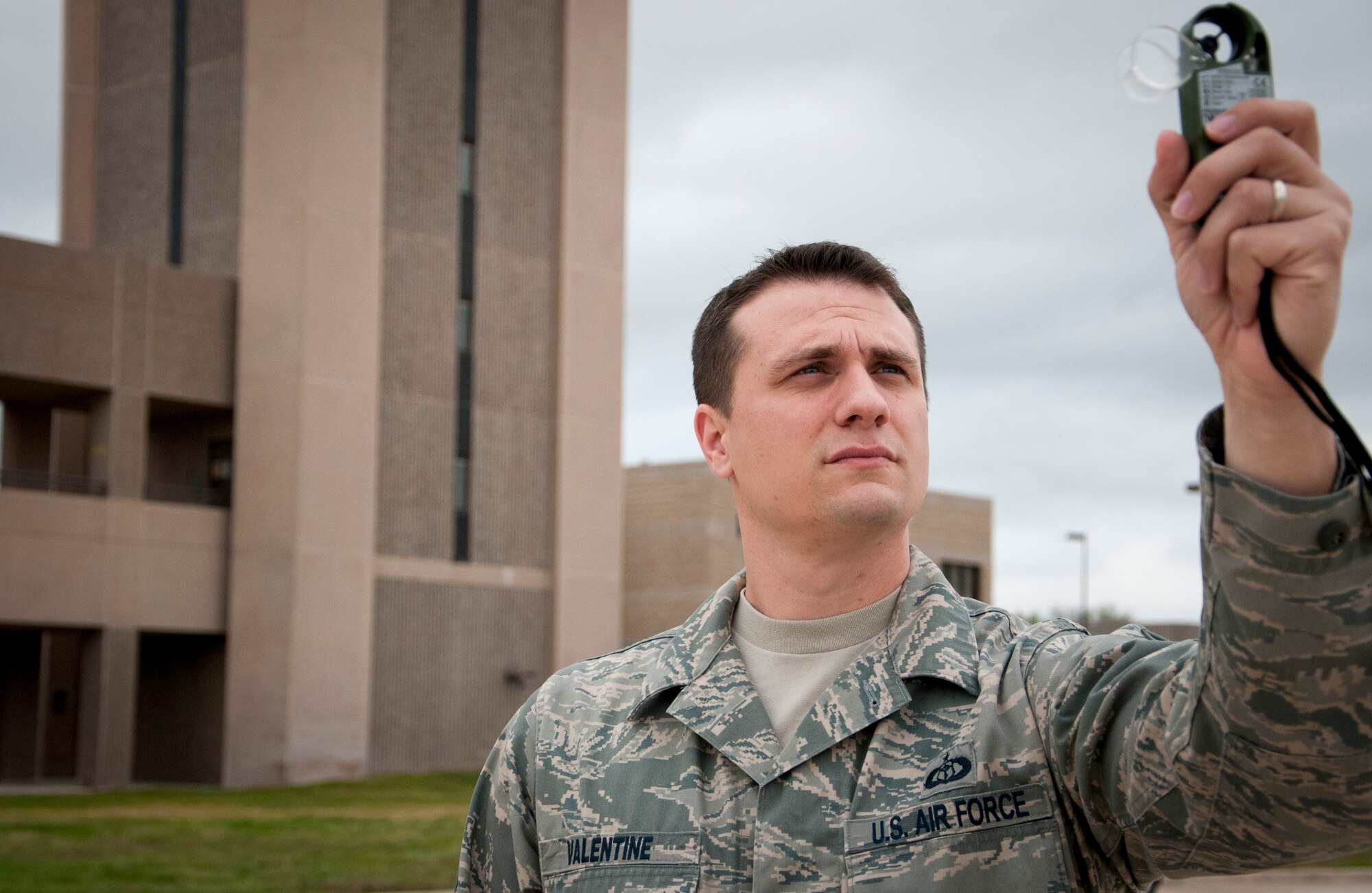 Tech. Sgt. Mitchell Valentine, 47th Operations Support Squadron NCO in charge of weather operations, checks weather patterns here at Laughlin Air Force Base, Texas, on March 28, 2013. Weather patterns are routinely checked to provide up-to-date, accurate information to Team XL. (U.S. Air Force photo by Airman 1st Class John D. Partlow)