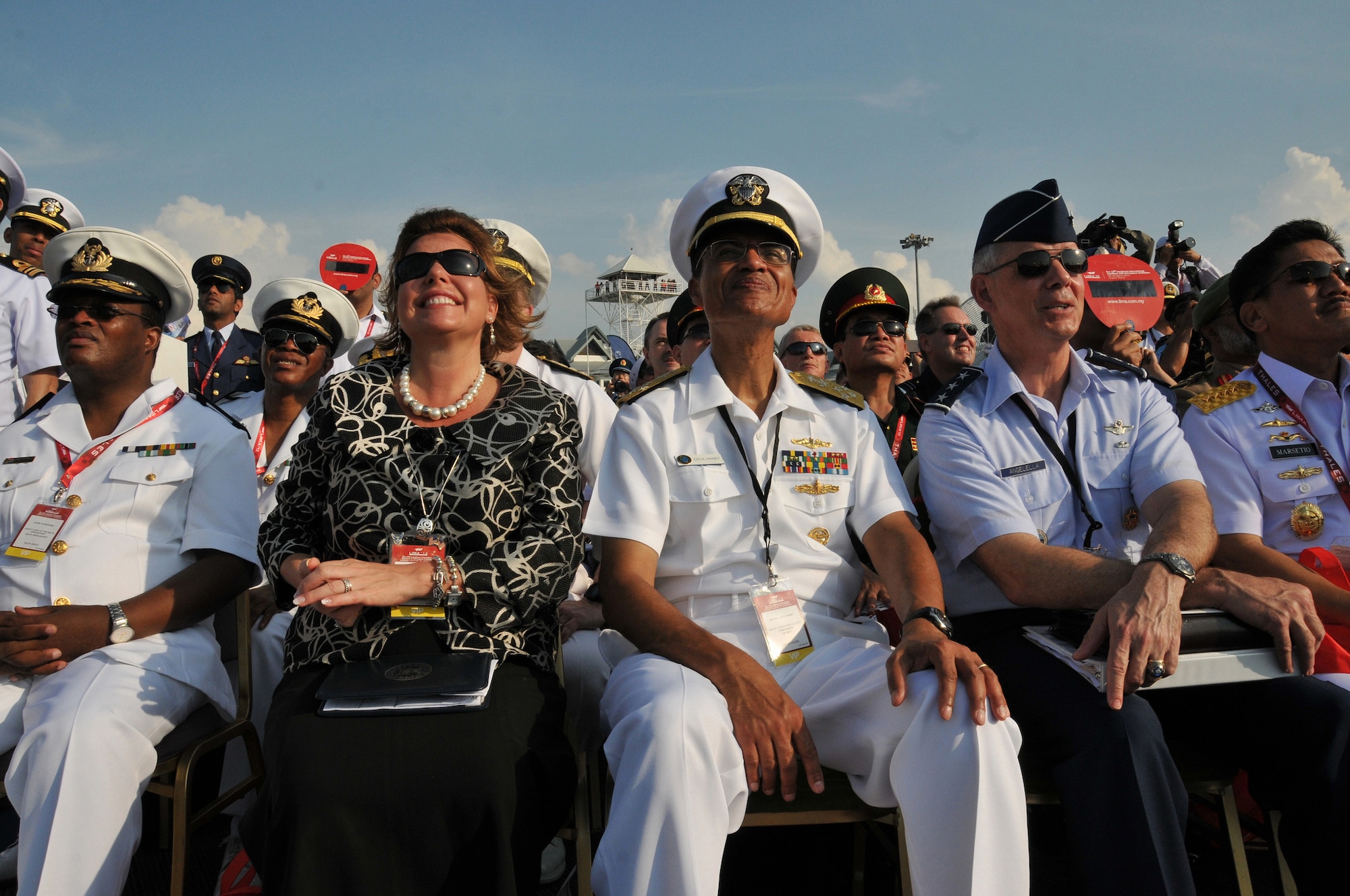 Adm. Cecil Haney, center, commander of U.S. Pacific Fleet; U.S. Air Force Lt. Gen Salvatore Angelella, Commander U.S. Forces Japan, right; and Ms. Heidi H. Grant, left, U.S. Deputy Under Secretary of the Air Force for International Affairs enjoy the opening ceremony of the 2013 Langkawi International Maritime and Aerospace Exhibition (LIMA 13) March 26, 2013, Langkawi, Malaysia. Aircraft and personnel of the U.S. Navy and U.S. Air Force are supporting the 4-day exhibition and aerial demonstrations March 26-30. Events such as LIMA 13 help contribute to increased understanding and interoperability which supports region stability and security throughout the Indo-Asia-Pacific region. (U.S. Navy photo/Mass Communication Specialist 1st Class Michelle Lucht)