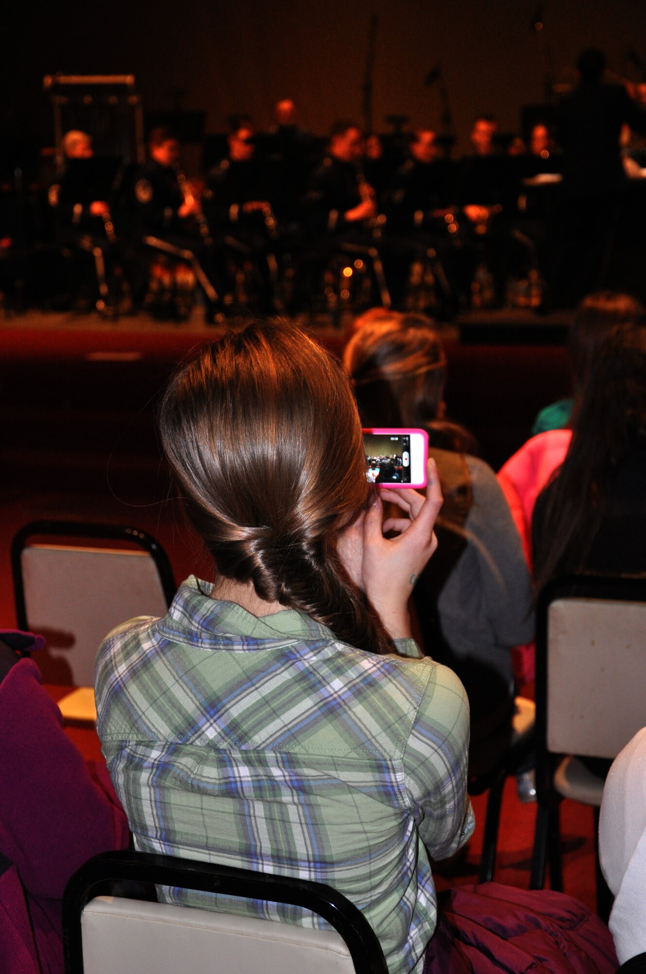 About 70 students from Wolf Branch Middle School in O'Fallon, Ill., watched the Air Mobility Command Band of Mid-America perform at the Valley of St. Louis-Scottish Rite Cathedral March 14, 2013, as part of the U.S. Air Force Band Educational Outreach Program. Following the performance, students interacted with members of the band to learn about music and the Air Force. (U.S. Air Force photo/Staff Sgt. Amber R. Kelly-Herard)