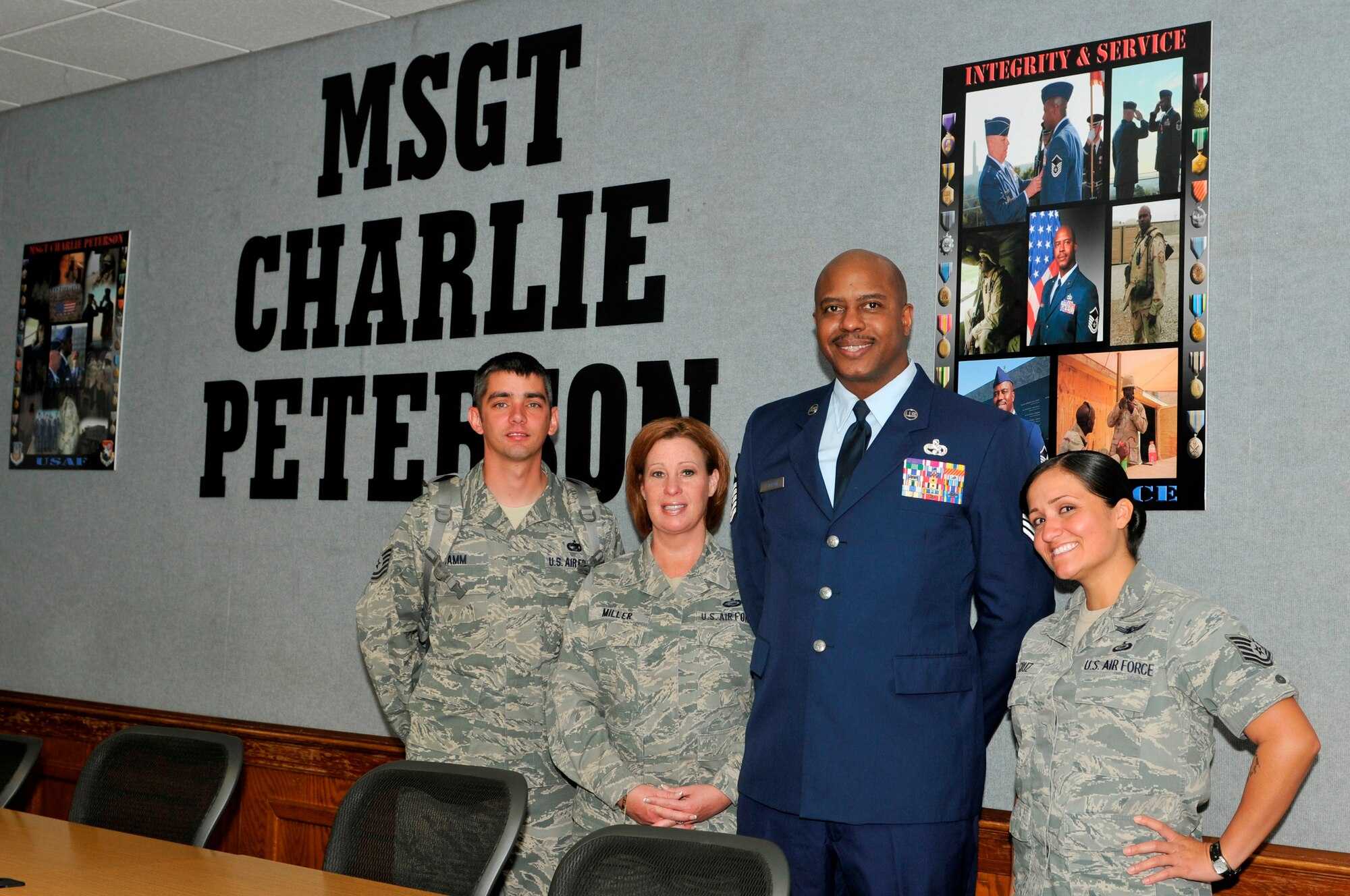 Master Sgt. Charlie Peterson, 127th Logistics Readiness Squadron vehicle operator at Selfridge Air National Guard Base, Mich., poses with the attendees of the Airey NCO Academy room dedication ceremony on March 27 at the Airey NCO Academy, on Tyndall Air Force Base. The Airey NCO Academy class 13-3 dedicated their Guardian Flight room to Sergeant Peterson. (U.S. Air Force Photo by Susan Trahan)