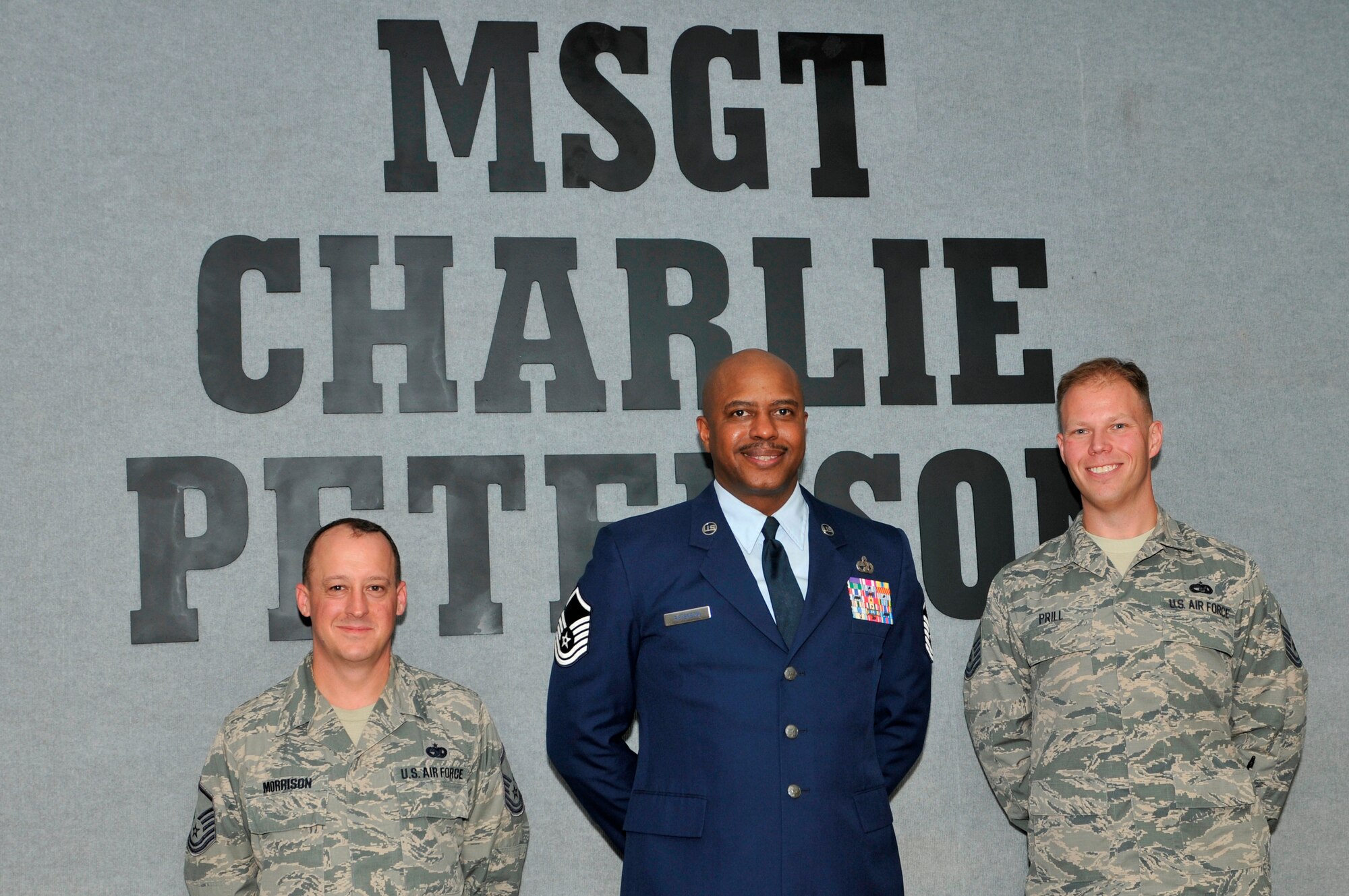 Master Sgt. Charlie Peterson, 127th Logistics Readiness Squadron vehicle operator at Selfridge Air National Guard Base, Mich., poses with the attendees of the Airey NCO Academy room dedication ceremony on March 27 at the Airey NCO Academy, on Tyndall Air Force Base. The Airey NCO Academy class 13-3 dedicated their Guardian Flight room to Sergeant Peterson. (U.S. Air Force Photo by Susan Trahan)