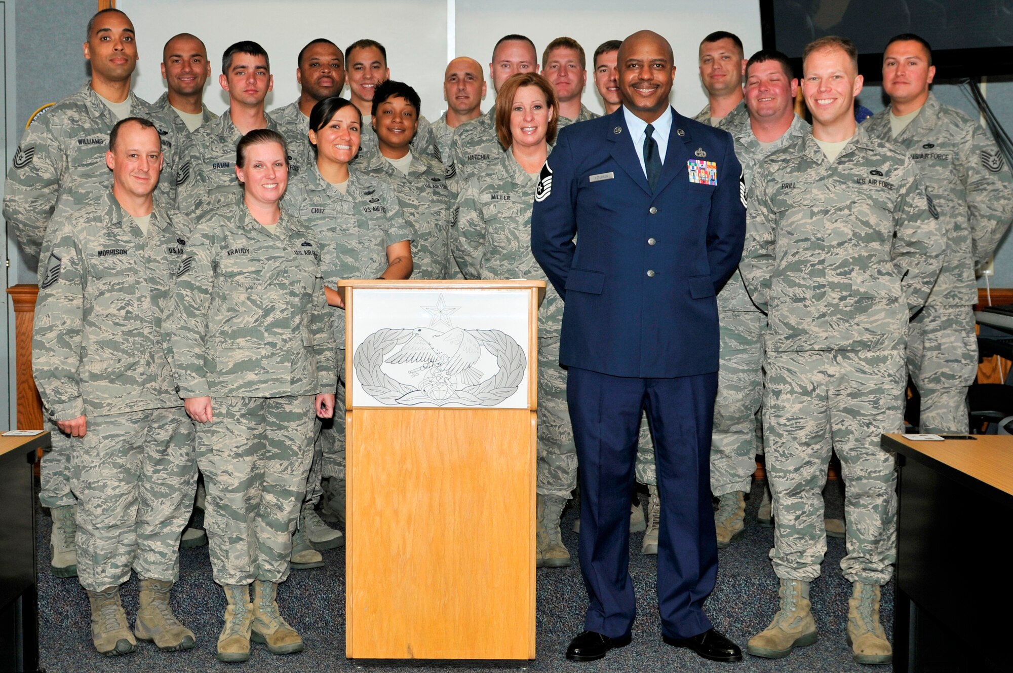Master Sgt. Charlie Peterson, 127th Logistics Readiness Squadron vehicle operator at Selfridge Air National Guard Base, Mich., poses with the attendees of the Airey NCO Academy room dedication ceremony on March 27 at the Airey NCO Academy, on Tyndall Air Force Base. The Airey NCO Academy class 13-3 dedicated their Guardian Flight room to Sergeant Peterson. (U.S. Air Force Photo by Susan Trahan)