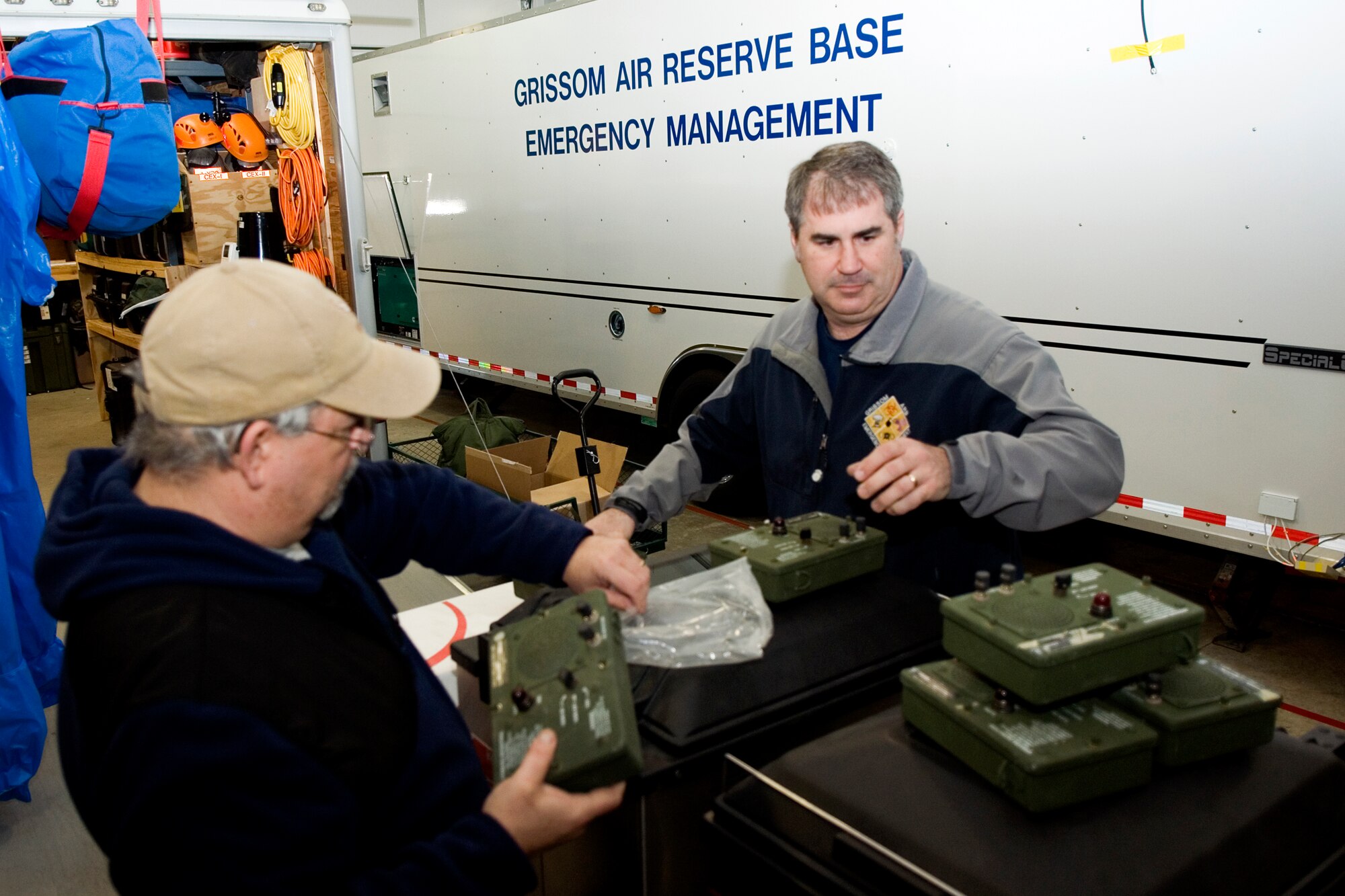 GRISSOM AIR RESERVE BASE, Ind. -- Bob Wydock, left and Dan DeAngulo, both 434th Civil Engineer Squadron base emergency managers, perform an inventory M-42 alarms in their shop. The alarms are used to sound the detection of chemical agents. (U.S. Air Force photo/Tech. Sgt. Douglas Hays)