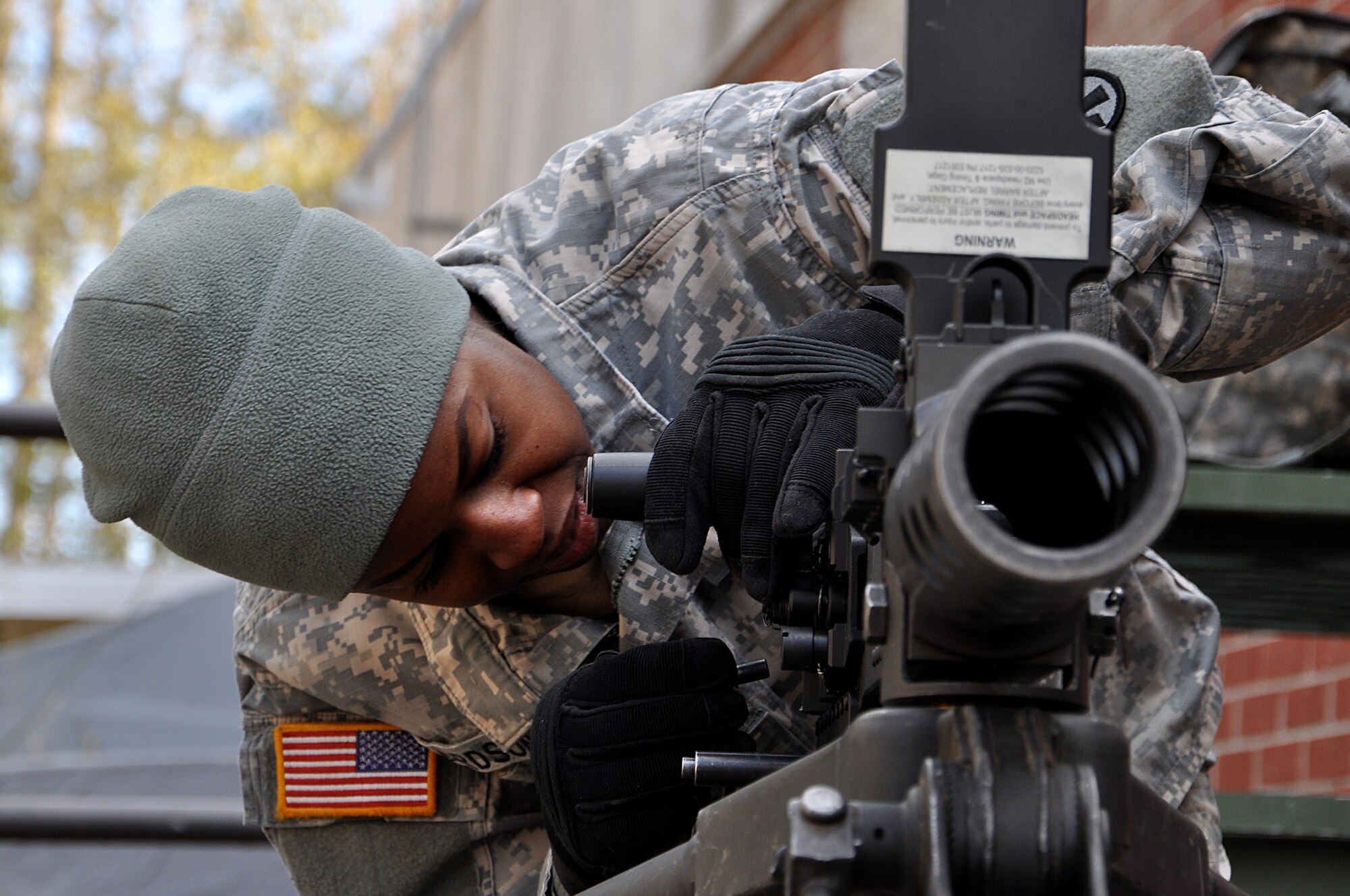 U.S. Army Spc. Nashon Richardson, 689th Rapid Port Opening Element cargo specialist, assembles a M2 .50 caliber heavy machine gun during the 597th Transportation Brigade’s annual Best Warrior Competition at Fort Eustis, Va., March 28, 2013. Each participant was required to successfully disassemble and reassemble the weapon as part of the “mystery challenge,” one of 11 events testing each Soldier’s skills. (U.S. Air Force photo by Tech. Sgt. April Wickes/RELEASED)