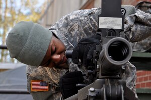 U.S. Army Spc. Nashon Richardson, 689th Rapid Port Opening Element cargo specialist, assembles a M2 .50 caliber heavy machine gun during the 597th Transportation Brigade’s annual Best Warrior Competition at Fort Eustis, Va., March 28, 2013. Each participant was required to successfully disassemble and reassemble the weapon as part of the “mystery challenge,” one of 11 events testing each Soldier’s skills. (U.S. Air Force photo by Tech. Sgt. April Wickes/RELEASED)