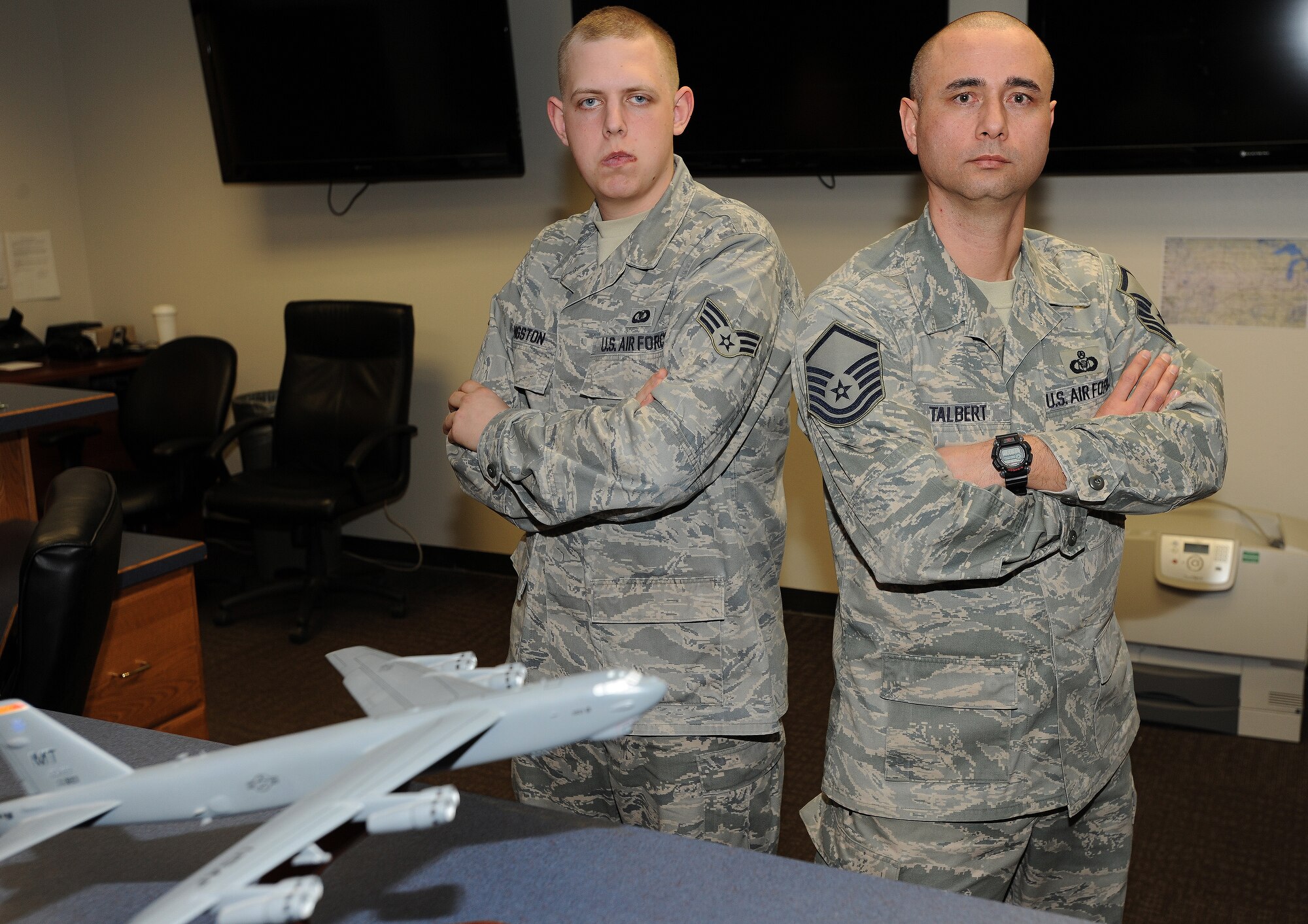 MINOT AIR FORCE BASE, N.D. -- Congratulations to Master Sgt. Sawat Talbert, 69th Bomb Squadron NCO in Charge of Squadron Aviation Resource Management and Senior Airman Adam D. Livingston, 69th BS SARM Journeyman, on winning the NCO and Airman category, respectively, for the 2012 Air Force Global Strike Command Aviation Resource Management Award competition. Both Airmen are entrusted to ensure aircrew members are physically and physiologically qualified to fly both the B-52H Stratofortress and the UH-1N Huey aircraft. During a deployment last year, they provided vital support for Headquarters missions as part of the 69th Expeditionary BS. Both will go on to compete at Headquarters Air Force. (U.S. Air Force photo/Senior Airman Jose L. Hernandez)
