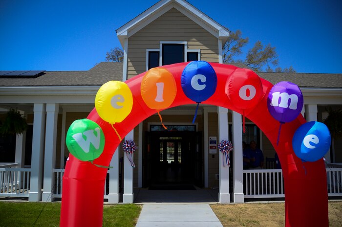 Forest City Military Communities held a ribbon cutting ceremony for the new Community Center March 29, 2013, at Joint Base Charleston – Air Base, S.C. The community center, located at 1501 Touhey Blvd. on the Air Base, is 5,696 square feet and includes a business center, a fitness center, a kitchen and activity center, showers, locker rooms and two housing management offices. (U.S. Air Force photo/Staff Sgt. Anthony Hyatt)