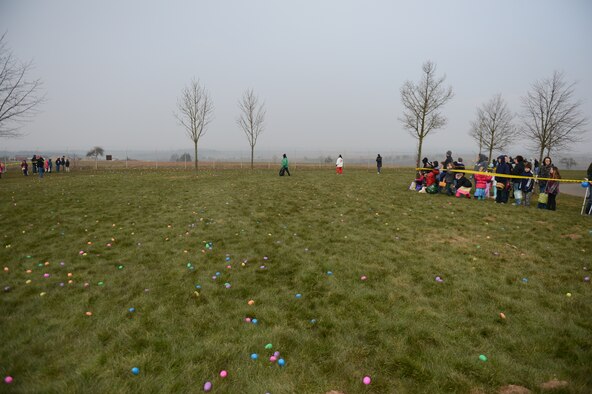 SPANGDAHLEM AIR BASE, Germany – Plastic eggs litter the ground in a field outside Club Eifel during an Easter celebration as part of the Month of the Military Child March 30, 2013. April is designated as the Month of the Military Child, and the Air Force provides special days and events to honor the family and their children. Volunteers scattered upwards of 9,000 plastic eggs on the field throughout the day. (U.S. Air Force photo by Airman 1st Class Gustavo Castillo/Released)