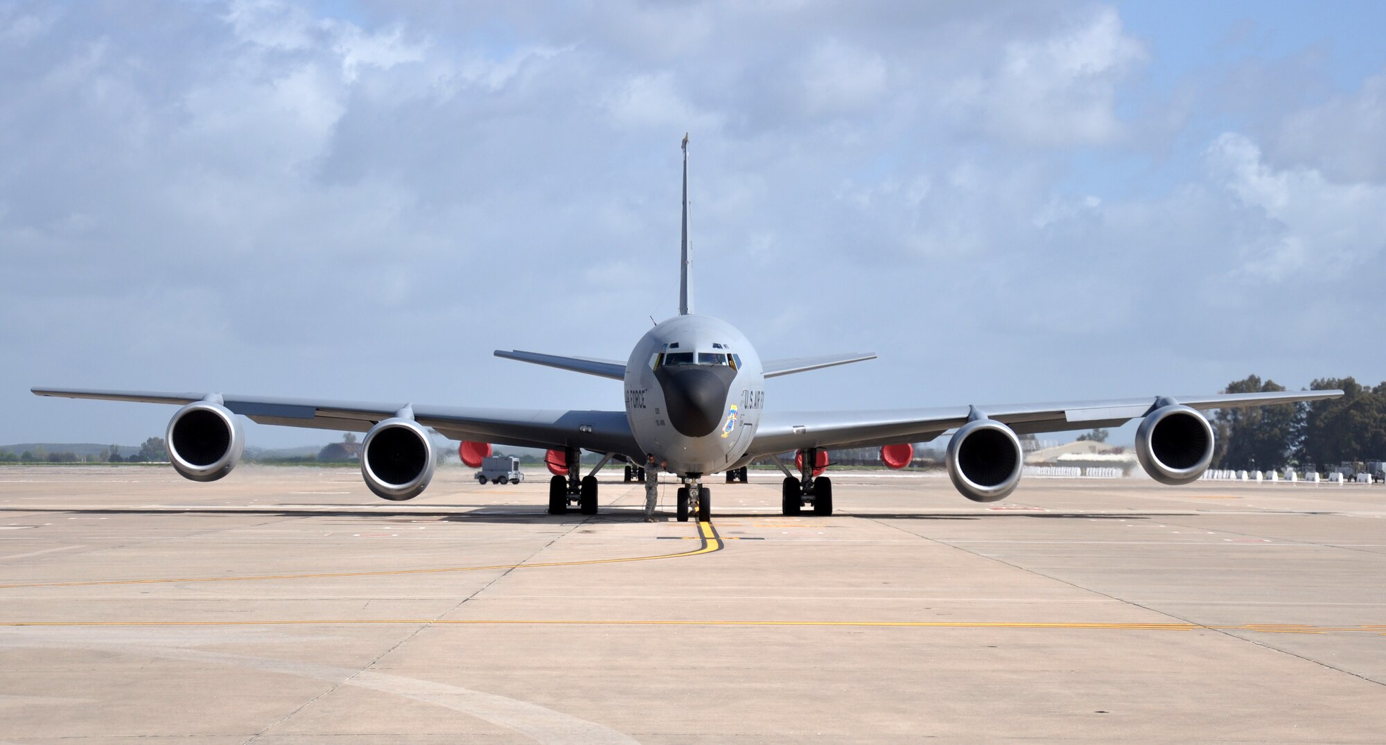 Airman 1st Class Jarred McGlothin, 100th Aircraft Maintenance Squadron, disconnects his headset from the aircraft prior to launching a KC-135 Stratotanker April 1, 2013. Airmen and aircraft deployed from the 100th Air Refueling Wing, RAF Mildenhall, England, to southwest Europe as the 351st Expeditionary Air Refueling Squadron Jan. 26, 2013. The 351st EARS has completed more than 130 sorties supporting French fighter aircraft conducting operations in Mali. The sorties include more than 6 million pounds of fuel transferred. (U.S. Air Force photo by Capt. Jason Smith)
