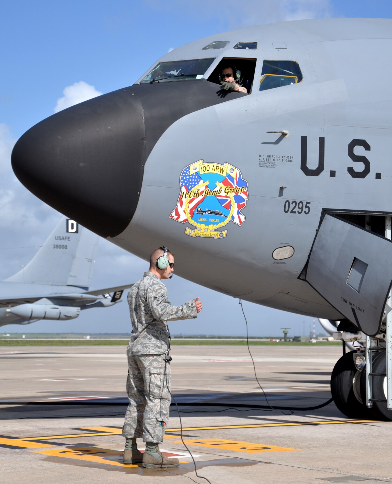 Airman 1st Class Jarred McGlothin (ground), 100th Aircraft Maintenance Squadron, communicates with Capt. Tim Gerne, 100th Air Refueling Wing pilot, prior to launching a KC-135 Stratotanker April 1, 2013. Airmen and aircraft deployed from the 100th ARW, RAF Mildenhall, England, to southwest Europe as the 351st Expeditionary Air Refueling Squadron Jan. 26, 2013. The 351st EARS has completed more than 130 sorties supporting French fighter aircraft conducting operations in Mali. The sorties include more than 6 million pounds of fuel transferred. (U.S. Air Force photo by Capt. Jason Smith)