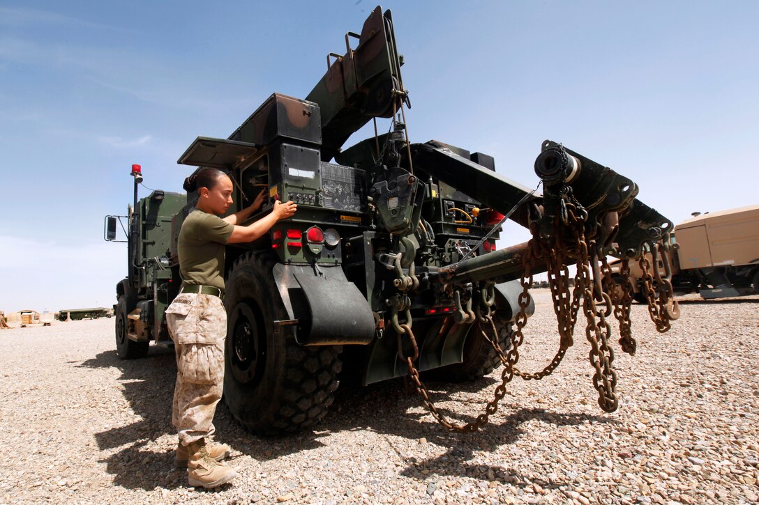 U.S. Marine Corps Cpl. Daisy A. Marrerocardoza performs a functions check on a medium tactical vehicle replacement MK-36 wrecker on Camp Leatherneck in Helmand province, Afghanistan, April 1, 2013. Marrerocardoza, a vehicle recovery operator, is assigned to Marine Support Squadron 271.