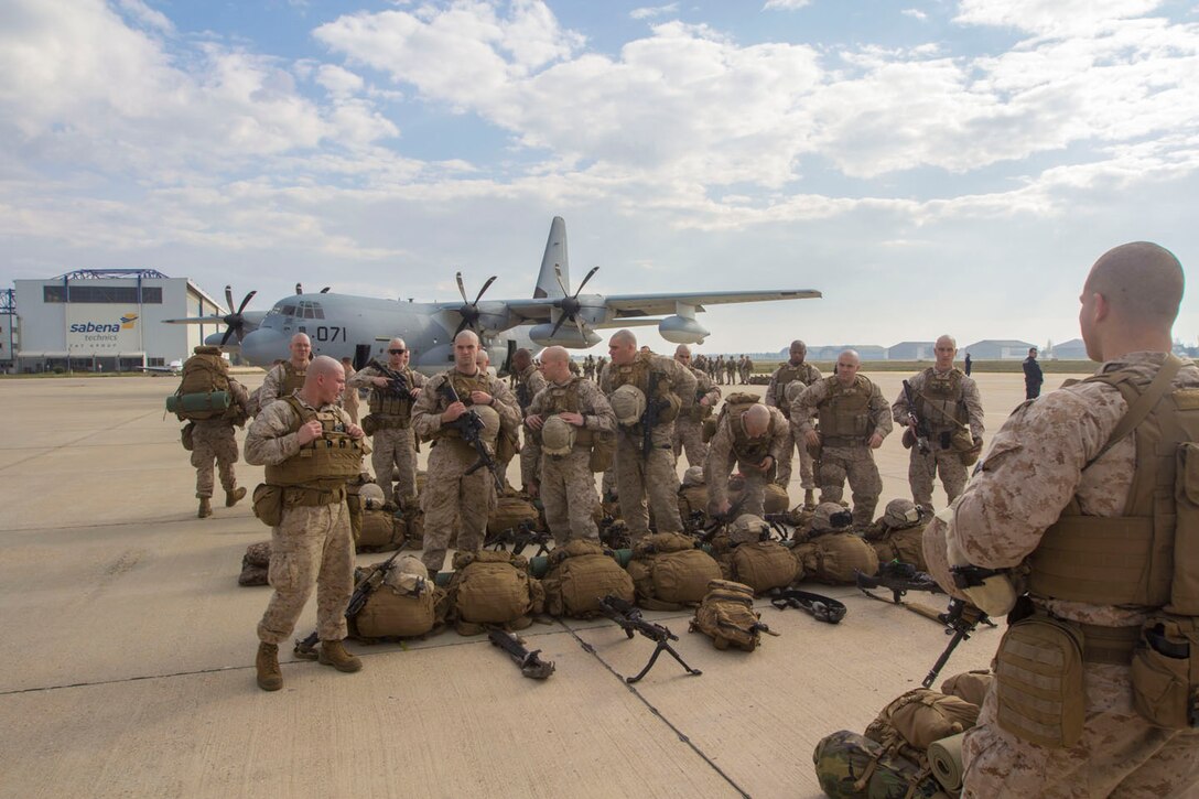 U.S. Marines and Sailors assigned to India Company, Battalion Landing Team 3/2, 26th Marine Expeditionary Unit (MEU), take accountability at Nimes Garon Airport, Nimes, France, March 25, 2013. The 26th MEU is deployed to the 6th Fleet area of operation. The MEU operates continuously across the globe, providing the president and unified combatant commanders with a forward-deployed, sea-based, quick-reaction force. The MEU is a Marine Air-Ground Task Force capable of conducting amphibious operations, crisis-response and limited contingency operations. (U.S. Marine Corps photo by Cpl. Kyle N. Runnels/Released)