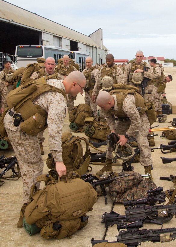 U.S. Marines and Sailors assigned to the 26th Marine Expeditionary Unit (MEU) prepare to leave Naval Station Rota, Spain, March 25, 2013. The 26th MEU is deployed to the 6th Fleet area of operation. The MEU operates continuously across the globe, providing the president and unified combatant commanders with a forward-deployed, sea-based, quick-reaction force. The MEU is a Marine Air-Ground Task Force capable of conducting amphibious operations, crisis-response and limited contingency operations. (U.S. Marine Corps photo by Cpl. Kyle N. Runnels/Released)