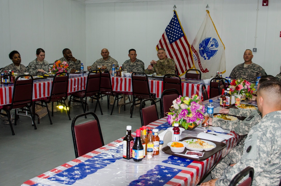 Sgt. Maj. of the Army Raymond F. Chandler III, speaks with senior noncommissioned officers over dinner at the Camp Arifjan, Kuwait Zone 2 dining facility during his visit to Kuwait March 28. (U.S. Army photo by Sgt. James Hale)
