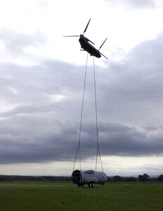 Members of the Pennsylvania Army National Guard's 104th Aviation Battalion airlifted a C-130 Sept. 14 in two massive pieces from Forty Fort Airport in Luzerne County to Tobyhanna Army Depot in Monroe County using a CH-47 Chinook helicopter.