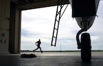 Crew chief Staff Sgt. Thomas Fitzgerald sprints to his F-15 Eagle after an alert alarm announces the immediate launch of aircraft during a training exercise for Operation Noble Eagle Oct. 3 at the 125th Fighter Wing, Det. 1, Homestead Air Reserve Base, Fla. The detachment provides the Continental NORAD Region commander rapid response to invasion of the sovereign airspace of the U.S., and responds with appropriate defense measures against all hostile actions directed at the people and property of the U.S. during Operation Noble Eagle.