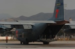 A C-130 Hercules aircraft from the North Carolina Air National Guard's 145th Air Wing taxies at Naval Air Station Point Mugu, Calif., Oct. 25, 2007. The aircraft is equipped with the Modular Airborne Fire Fighting System and is being used to fight wildfires in Southern California.