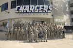 The 1-184th Infantry Battalion Charlie Company takes a well-deserved break Friday, October 26, 2007 after providing perimeter security and assisting volunteers and evacuees at the San Diego Chargers' Qualcom Stadium in California in support of Operation Fall Blaze.