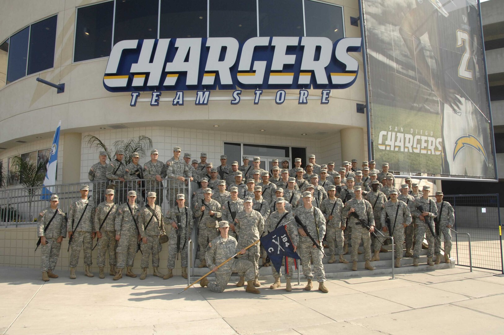 The 1-184th Infantry Battalion Charlie Company takes a well-deserved break Friday, October 26, 2007 after providing perimeter security and assisting volunteers and evacuees at the San Diego Chargers' Qualcom Stadium in California in support of Operation Fall Blaze.