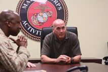Brigadier General Richard L. Simcock, II, Deputy Commander, US Marine Corps Forces Pacific, speaks to assembled personnel of Marine Corps Activity Guam about the importance of mission-readiness aboard the island during his visit aboard U.S. Naval Computer and Telecommunications Station Guam, April 3, 2013.  BGen. Simcock visited the island during a tour of the Pacific forces and to see more of the realignment in the region.