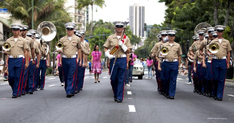 HONOLULU - The Marine Corps Forces, Pacific band marches down Kalakaua Avenue toward Kapiolani Park during the 11th annual Prince Kuhio Commemoration Parade in Honolulu, March 23. The parade commemorated the life and events of Prince Jonah Kuhio Kalanianaole for various achievements, such as the Hawaiian Homestead Act of 1921 and being the first Hawaiian elected to the U.S. Congress. (U.S. Marine Corps photo by Lance Cpl. Matthew Bragg)