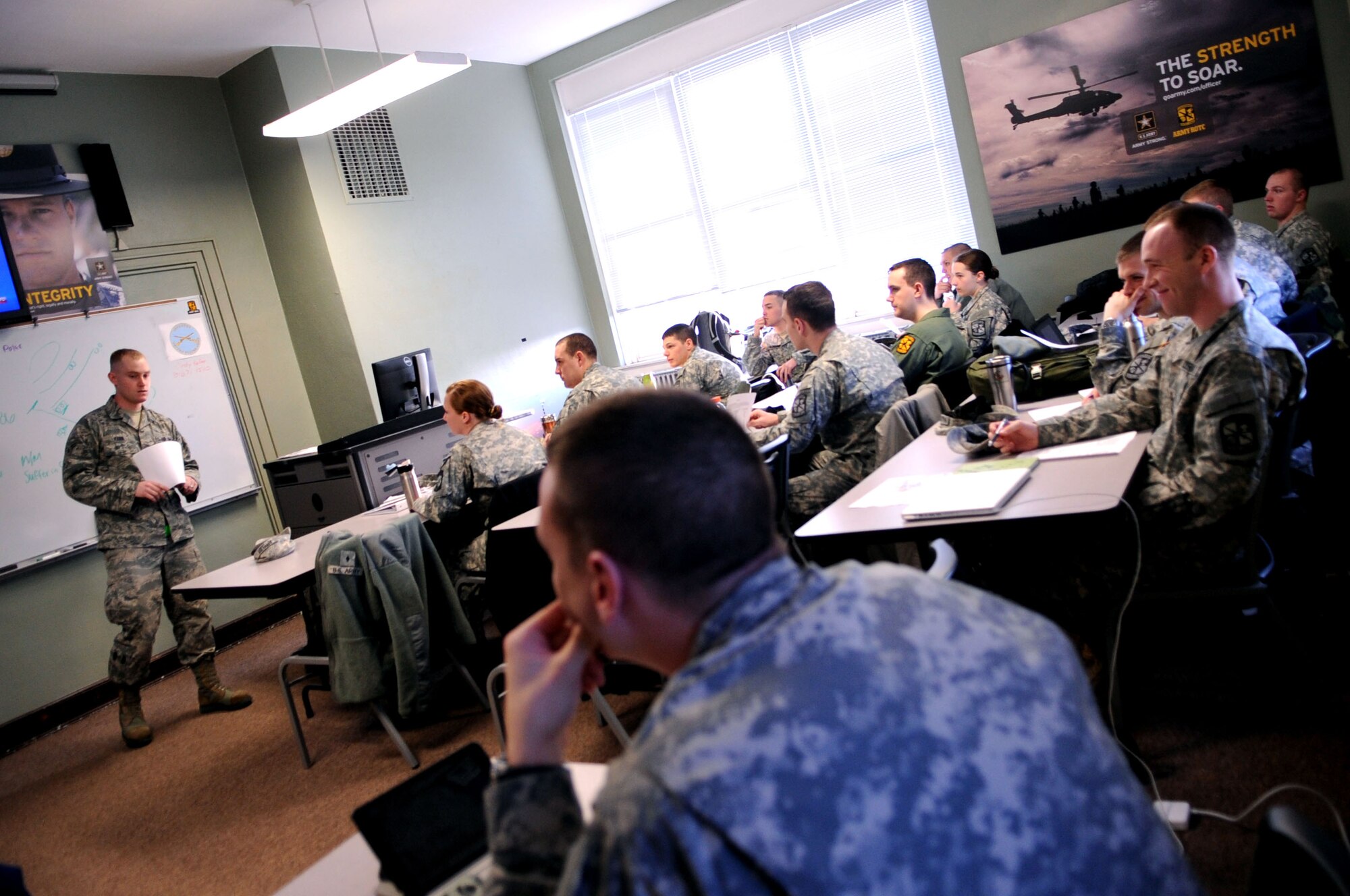 Airman 1st Class Jonathan Kern, 319th Logistics Readiness Squadron Traffic Management Office, briefs University of North Dakota Army Reserve Officer Training Corps (ROTC) cadets about their upcoming permanent change of station requirements at UND Campus Grand Forks, N.D., April 2, 2013. The Grand Forks Air Force Base TMO and Military Personnel Section volunteered to brief the soon-to-be-commissioned Army ROTC cadets about what to do before moving to their first duty station. (U.S. Air Force photo /Staff Sgt. Amanda N. Grabiec)