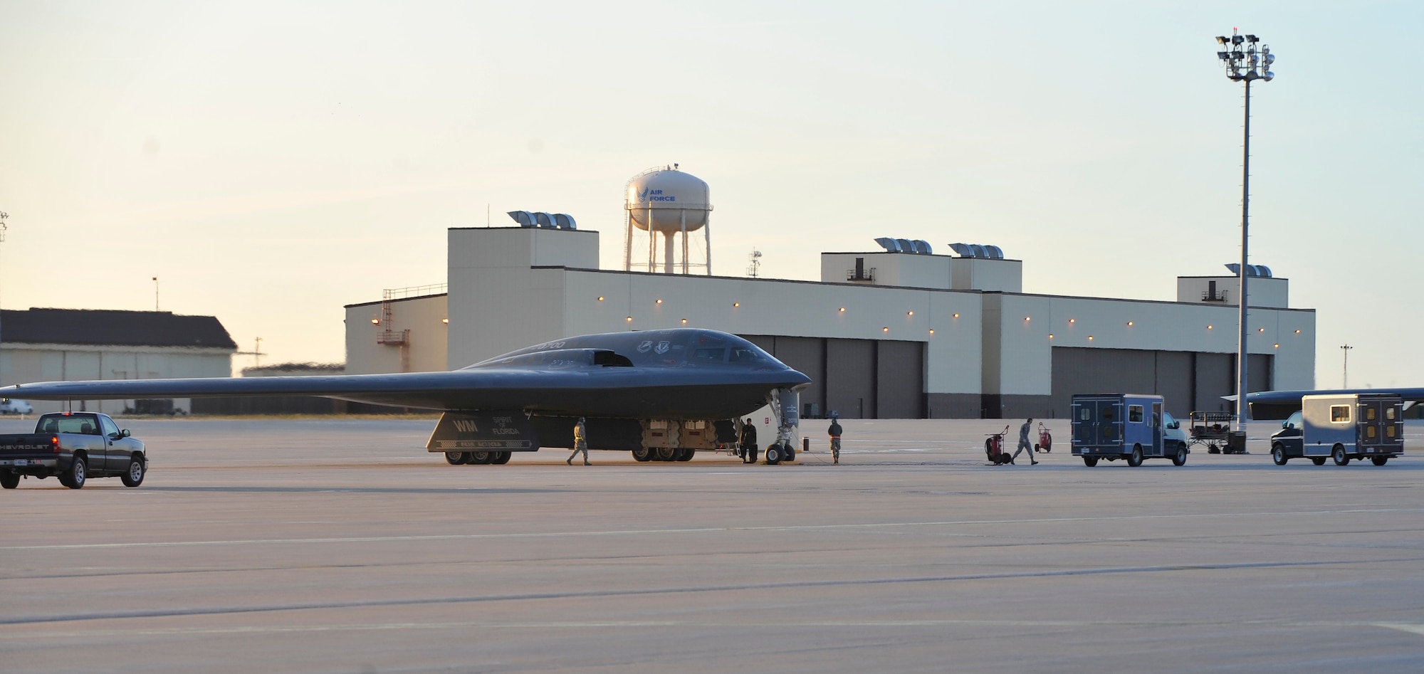 U.S. Air Force B-2 Spirit crew chiefs examine the B-2 Spirit at Whiteman Air Force Base, Mo., April 1, 2013. During the preceding flight, the “Spirit of Florida” surpassed 7,000 flight hours, the first of the 20 B-2 Spirits to do so. (U.S. Air Force photo by Airman 1st Class Keenan Berry/Released)