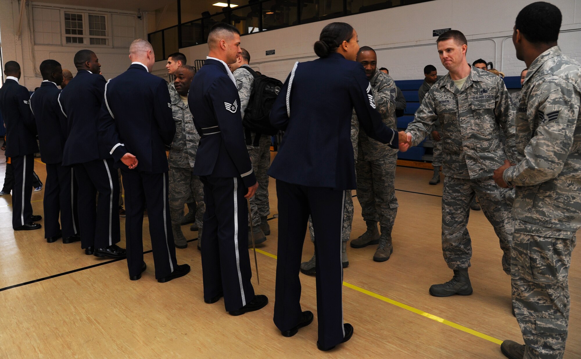 U.S. Air Force Honor Guard Drill Team meets with Airmen at Langley Air Force Base, Va., during a recruitment visit March 29, 2013.  The vision of the Honor Guard is to ensure a legacy of Airmen who promote the mission, protect the standards, perfect the image and preserve the heritage of the Air Force. (U.S. Air Force photo by Airman 1st Class Victoria H. Taylor/Released)
