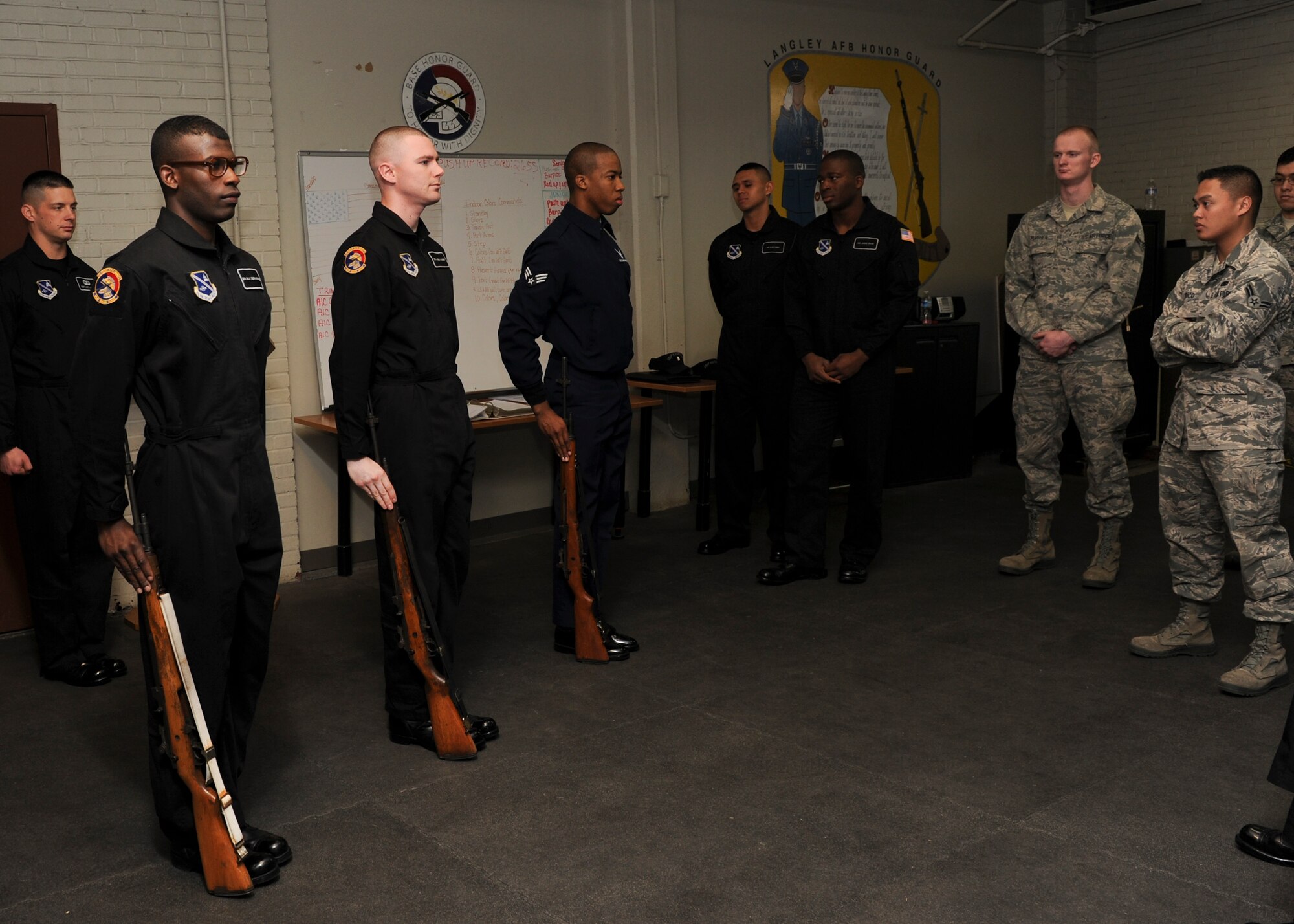 Members of the U.S. Air Force Honor Guard guide Langley Air Force base honor guard Airmen toward perfecting their skills at Langley  Air Force Base, Va., March 29, 2013.  Air Force Honor Guard visited Langley with hopes of inspiring and recuiting interested Airmen. (U.S. Air Force photo by Airman 1st Class Kimberly Nagle/Released)