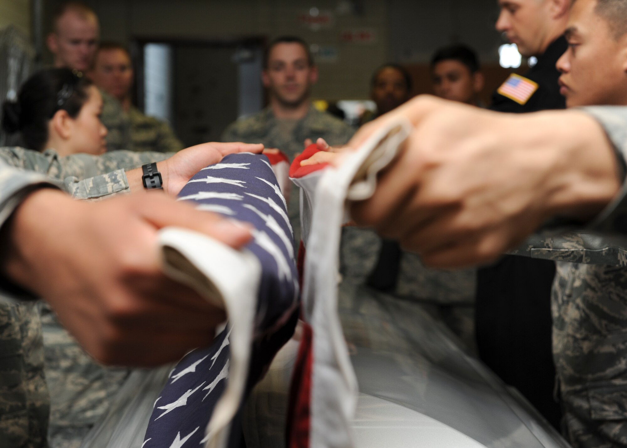 Airmen from the Langley Air Force Base honor guard demonstrate their skills in front of U.S. Air Force Honor Guard Airmen while they visit Langley Air Force Base, Va., March 29, 2013.  The visit from USAFHG gave the Langley honor guard an up-close look within the ceremonial unit. (U.S. Air Force photo by Airman 1st Class Kimberly Nagle/Released)