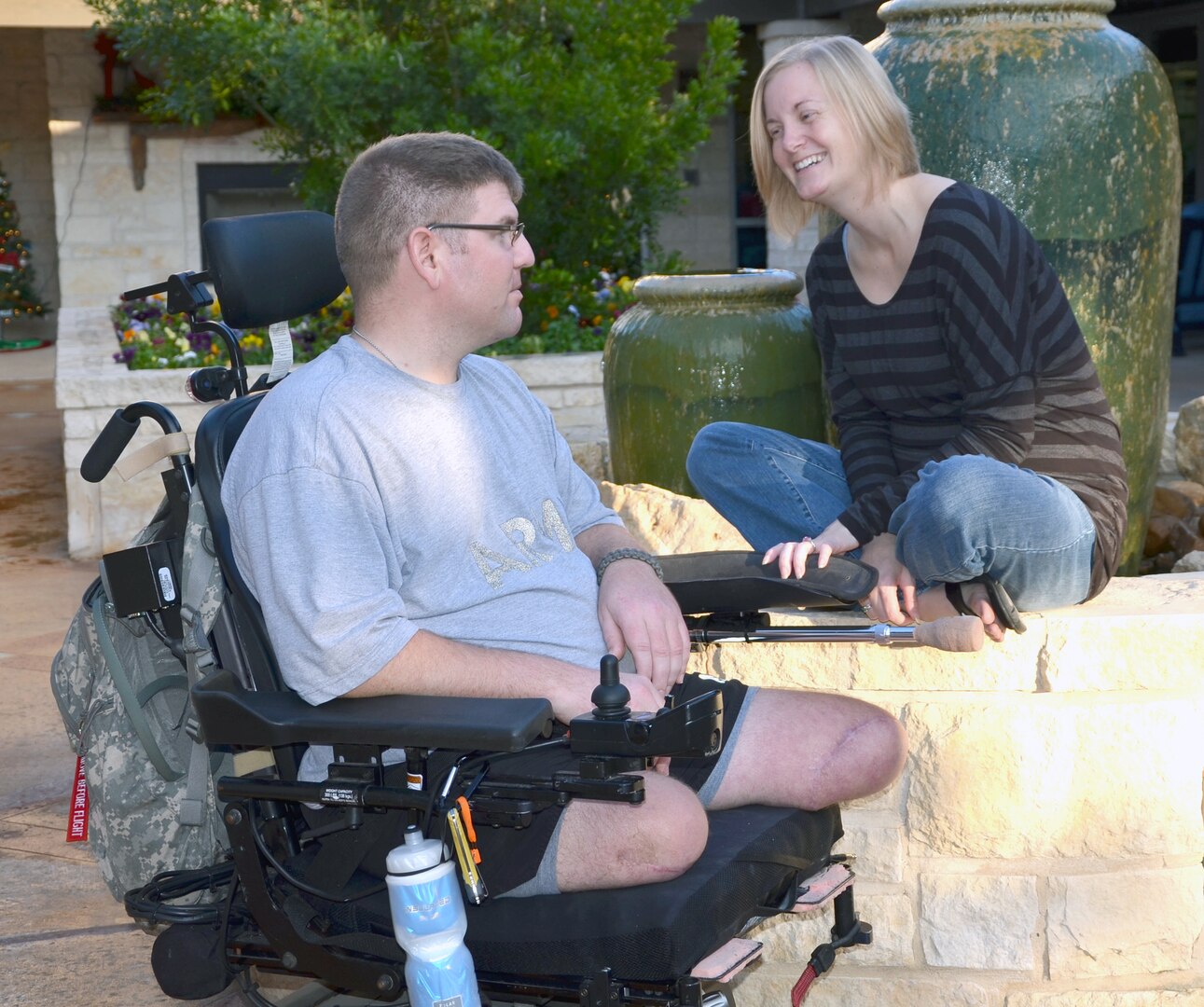 Sgt. Ed Matayka spends a quiet moment with his wife, Karen, at the Warrior and Family Support Center near San Antonio Military Medical Center. The Vermont National Guard medic lost both legs and suffered a brain injury after a roadside bomb blew up his vehicle in Afghanistan in July 2010. (Photo by Lori Newman, Joint Base San Antonio-Fort Sam Houston Public Affairs)