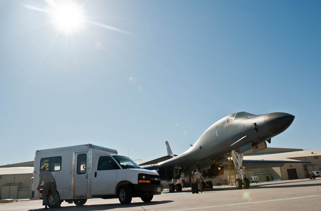 Aerospace propulsion technicians assigned to the 28th Aircraft Maintenance Squadron, prepare to inspect the propulsion system of a B-1 bomber parked on the flightline at Ellsworth Air Force Base, S.D., March 28, 2013. The B-1 bomber is equipped with four powerful turbofan engines that can produce more than 120,000 pounds of thrust. (U.S. Air Force photo by Airman 1st Class Zachary Hada/Released)