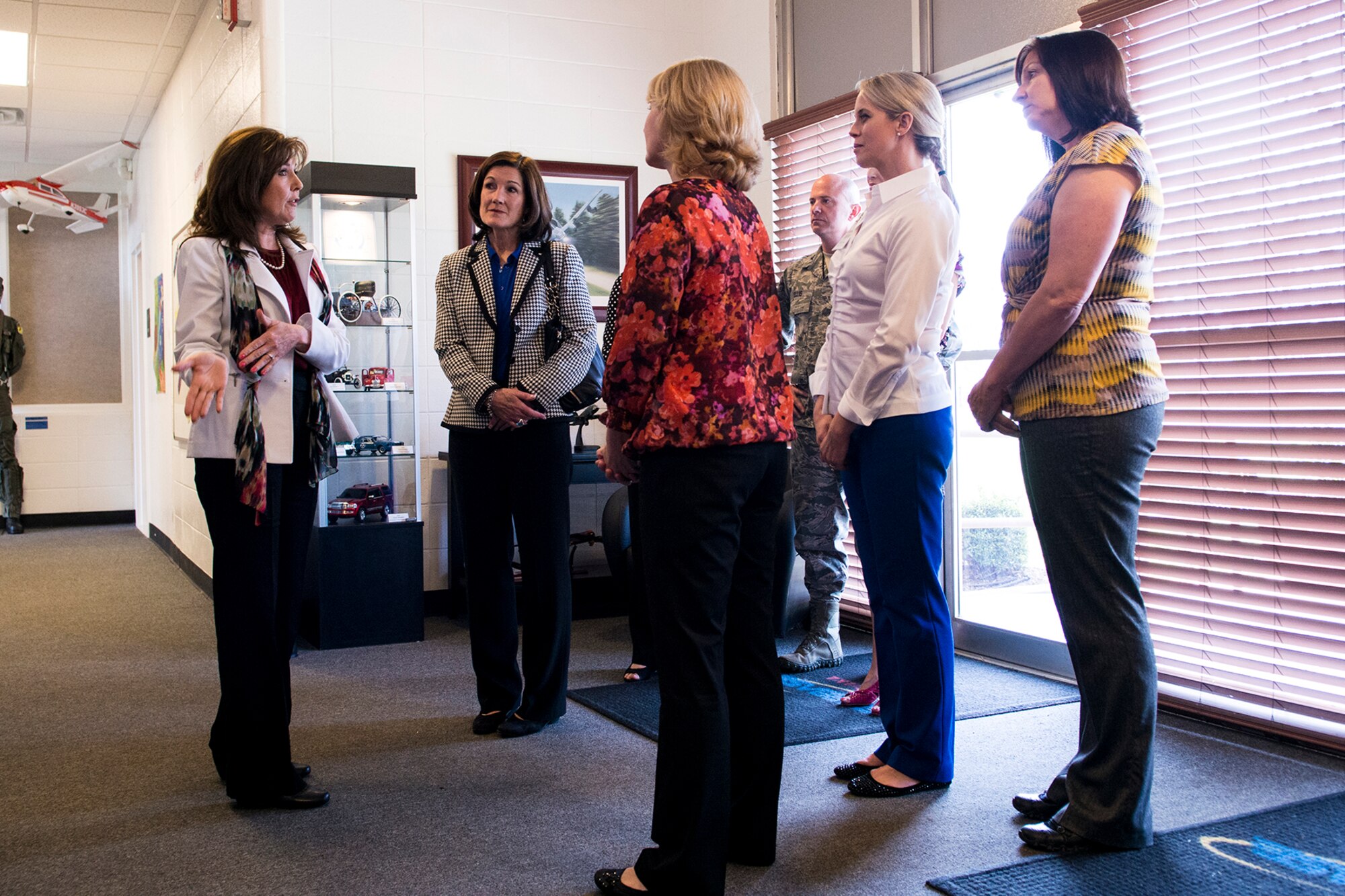 STARBASE executive director Kathy Brandon talks about the mission of STARBASE Louisiana during a tour for Betty Welsh, wife of Air Force Chief of Staff Gen. Mark A. Welsh III, and Athena Cody, wife of Chief Master Sgt. of the Air Force James Cody, April 2, 2013, at Barksdale Air Force Base. (U.S. Air Force photo by Master Sgt. Greg Steele/Released)