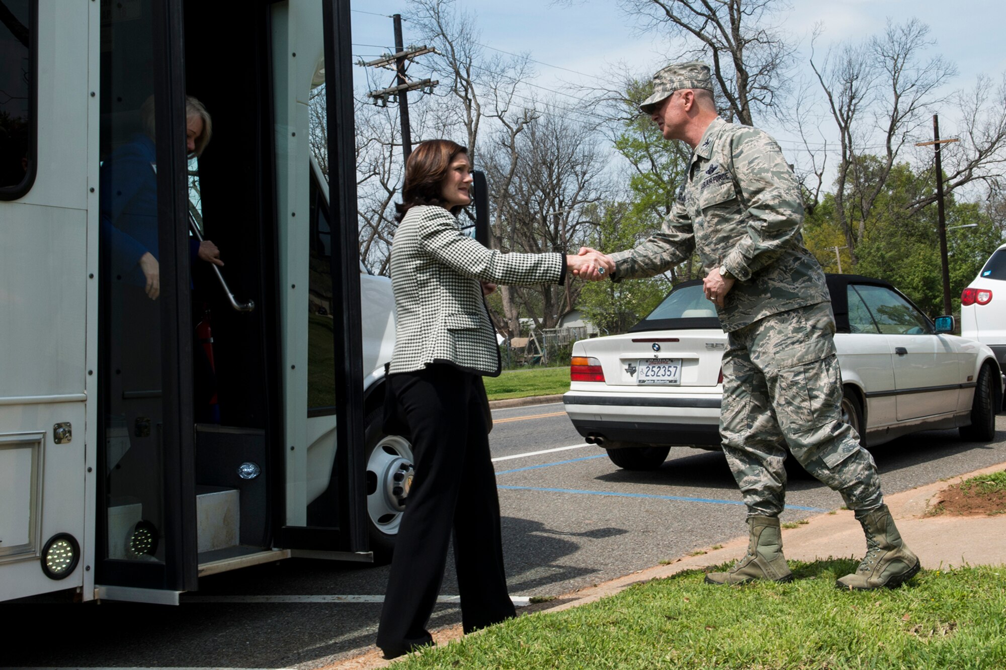 U.S. Air Force Col. Jonathan Ellis, 307th Bomb Wing commander, welcomes Betty Welsh to a tour of STARBASE Louisiana, April 2, 2013, at Barksdale Air Force Base. Welsh is the wife of Air Force Chief of Staff Gen. Mark A. Welsh III. (U.S. Air Force photo by Master Sgt. Greg Steele/Released)