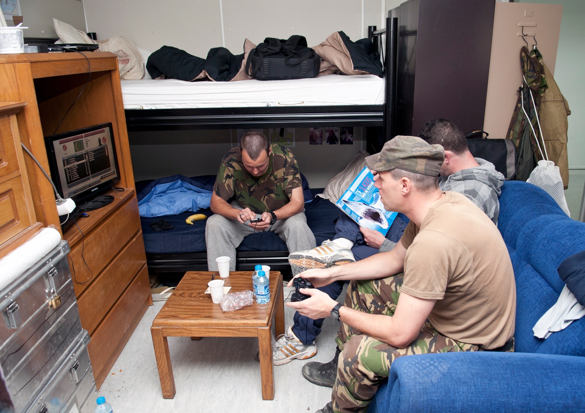Dutch army soldiers relax during their off time in their room in Patriot Village Feb. 22, 2013, at Incirlik Air Base, Turkey. Patriot Village is Incirlik's contingency lodging facility capable of housing more than 1,200 people. (U.S. Air Force photo by Senior Airman Daniel Phelps/Released)