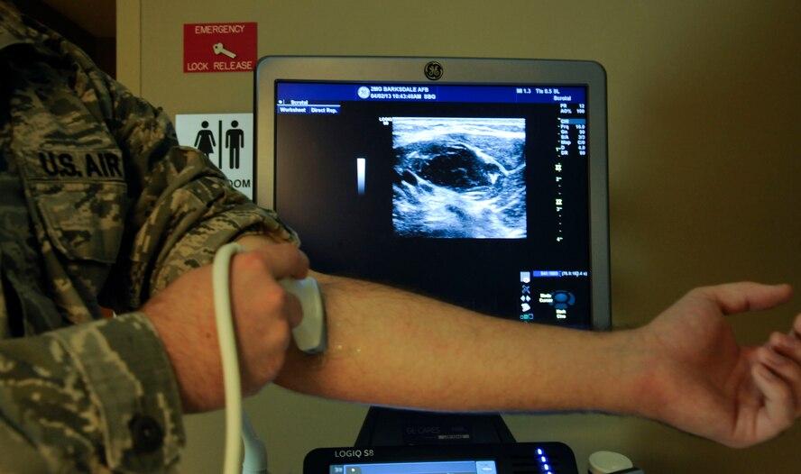 Staff Sgt. Andrew Bouck, 2nd Medical Group Biomedical Equipment Technician NCO in-charge of medical maintenance, tests an ultrasound machine on Barksdale Air Force Base, La., April 2, 2013. Although most commonly used for neonatal care, ultrasound machines can be used for other tasks such as detecting objects within the human body or provide images of muscles and organs. (U.S. Air Force photo/Airman 1st Class Andrew Moua)