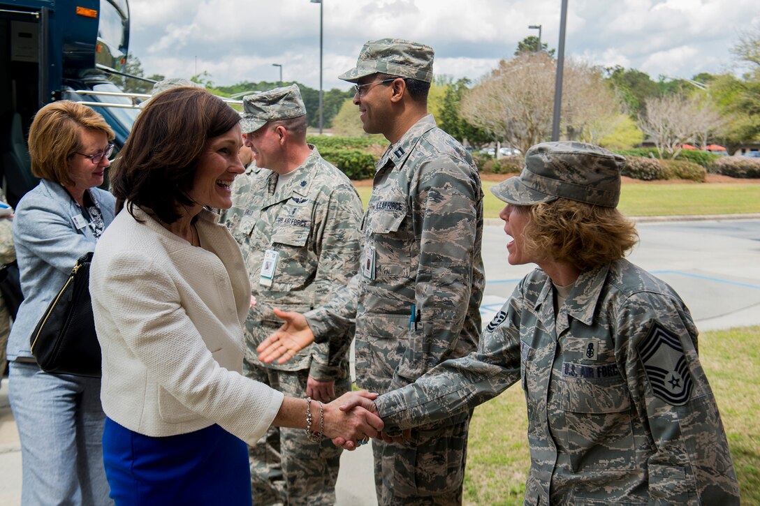 Betty Welsh, wife of Air Force Chief of Staff Gen. Mark A. Welsh III, shakes hands with Chief Master Sgt. Dianna Vallely, 23d Medical Group chief enlisted manager, April 1, 2013, at Moody Air Force Base, Ga. Welsh met with the medical group to discuss the base's Exceptional Family Member Program and learn more about Moody's Health and Wellness Center. (U.S. Air Force photo by Staff Sgt. Jamal D. Sutter)