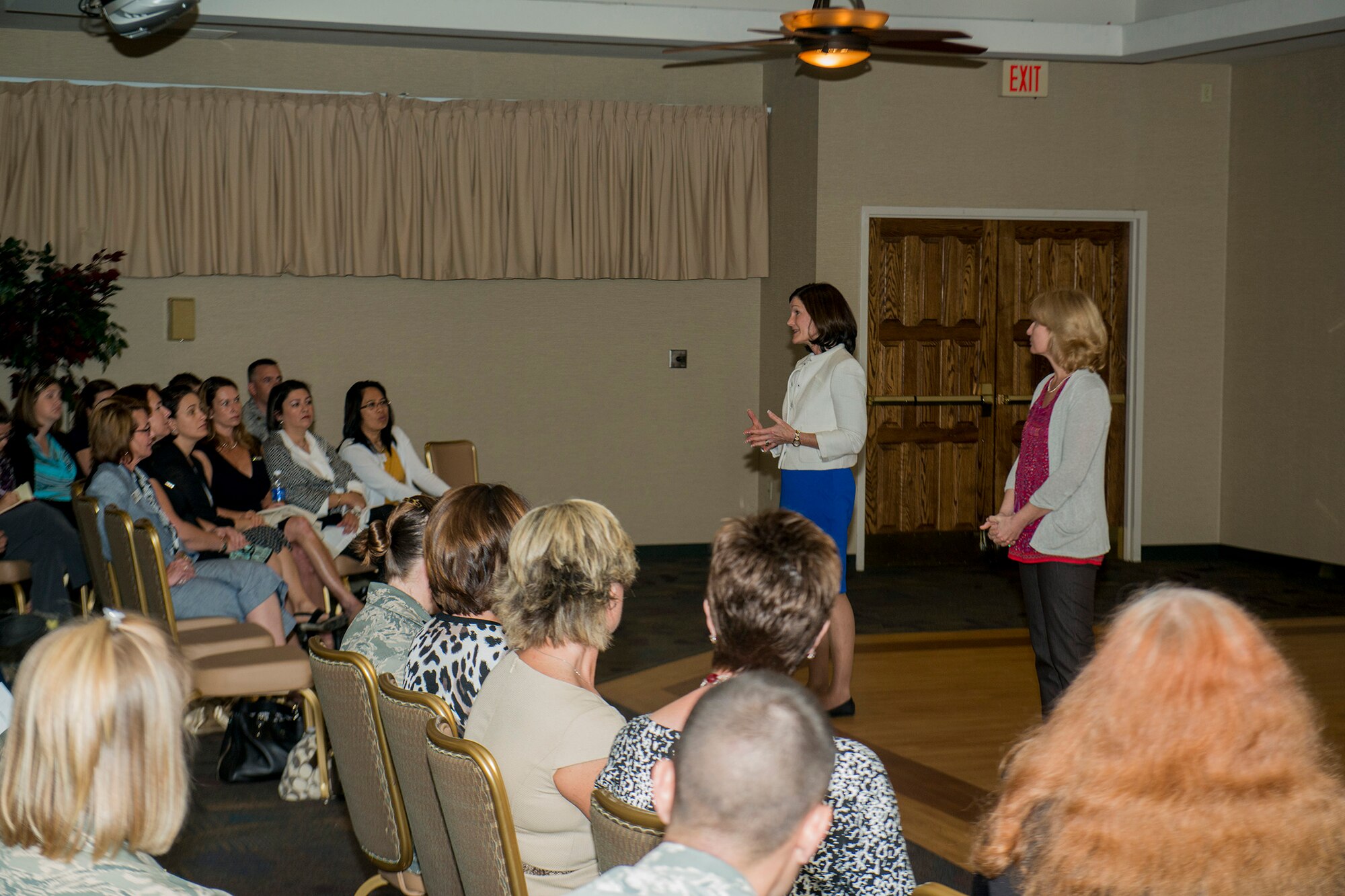 Betty Welsh, wife of Air Force Chief of Staff Gen. Mark A. Welsh III, and Athena Cody, wife of Chief Master Sgt. of the Air Force James Cody, give remarks during a key spouse meeting, April 1, 2013, at Moody Air Force Base, Ga. Welsh and Cody met with Team Moody key spouses to share their experiences and learn more about Moody's key spouse program. (U.S. Air Force photo by Staff Sgt. Jamal D. Sutter)