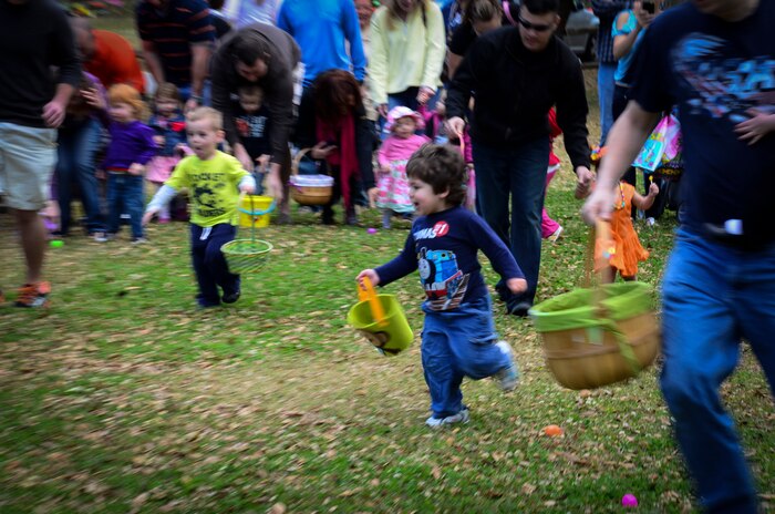Children in the youngest age group and their parents look for eggs during the Easter Egg Hunt at the annual Easter Event March 30, 2013, at Marrington Plantation on Joint Base Charleston – Weapons Station, S.C. More than 500 participants attended this year’s event, according to Robert Veronee, JB Charleston – Weapons Station Youth Center coordinator. (U.S. Air Force photo/Staff Sgt. Anthony Hyatt)